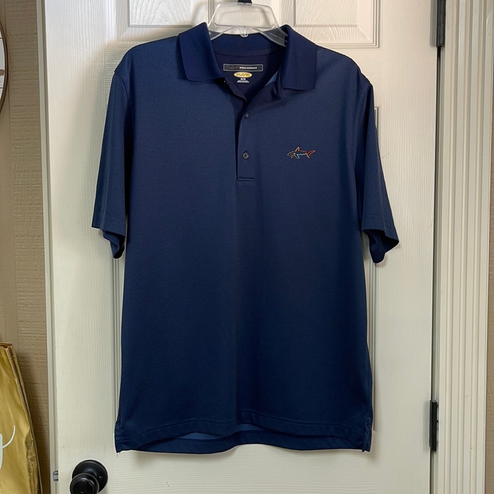 Greg Norman play dry size medium shirt. Great condition! Navy blue